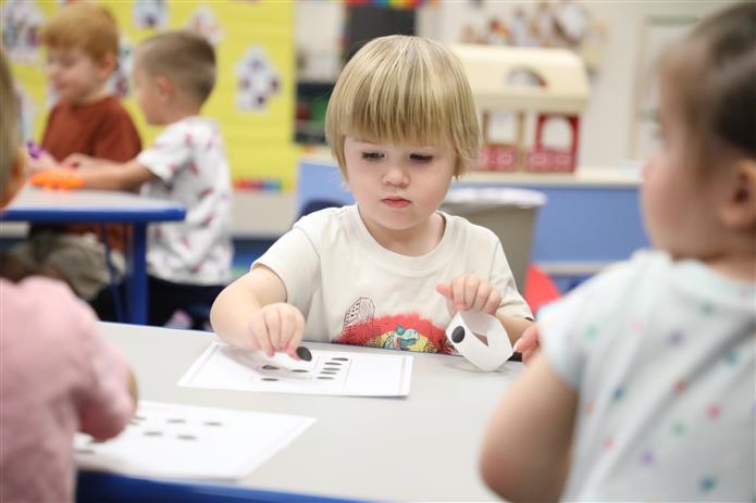   Students playing while they are at Kids Express After Care Program